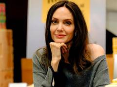 
      
      Angelina Jolie reveals she wanted to be a funeral director
      
      