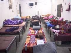 
      
      People take refuge at night shelters as temperature dips in Delhi
      
      