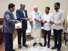 
      
      Sharad Pawar meets PM Modi along with farmers from Maharashtra
      
      
