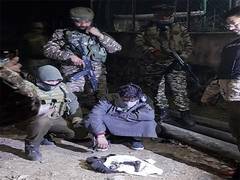 
      
      Terrorist associate held with arms and ammunition in Kashmir
      
      
