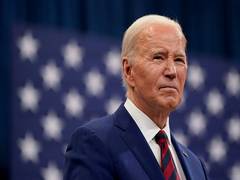 
      
      US President Biden honours former Indian PM Manmohan Singh
      
      