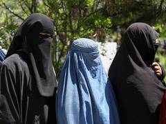 
      
      Taliban bars women from looking out of windows
      
      