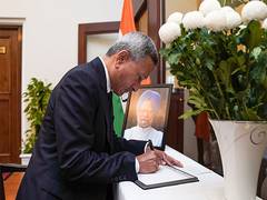 
      
      Singapore's Minister signs condolence book for Manmohan Singh
      
      
