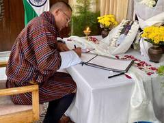 
      
      Bhutan PM signs condolence book in memory of Manmohan Singh
      
      