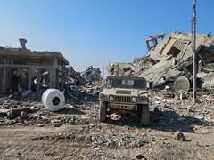 
      
      Israel razes Gaza neighborhood overlooking Sderot
      
      