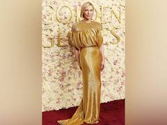 
      
      Cate Blanchett repeats iconic gold gown at Golden Globes
      
      
