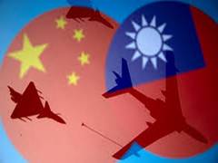 
      
      China builds specialised barges for 'putative invasion of Taiwan'
      
      