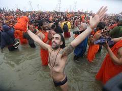 
      
      Massive turnout at Maha Kumbh on Makar Sankranti; Foreign devotee
      
      
