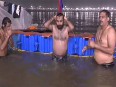 
      
      Maha Kumbh: Devotees take Amrit Snan, participate in Aarti 
      
      