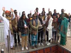 
      
      21-member team from 10 countries visits Sangam in Prayagraj
      
      