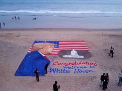 
      
      Sudarsan Pattnaik creates 47-foot-long sand art of Donald Trump a
      
      