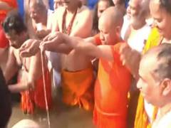 
      
      UP CM Yogi takes holy dip at Sangam at MahaKumbh 
      
      