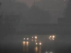 
      
      Delhi records min temp of 11 degrees; trains and flights delayed
      
      