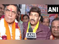 
      
      BJP's Manoj Tiwari urges people to support Mohan Singh Bisht
      
      