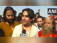 
      
      Bageshwar Dham chief takes holy dip at Sangam
      
      