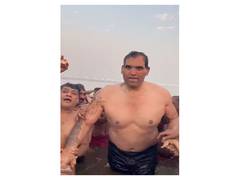 
      
      WWE Wrestler Khali takes holy dip in Triveni Sangam
      
      
