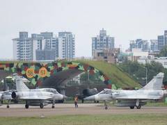 
      
      Readying for war, PLA burrows underground and hardens air bases
      
      