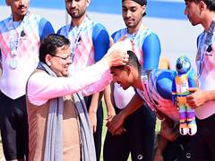 
      
      CM Dhami presents medals to cyclists at 38th National Games 
      
      
