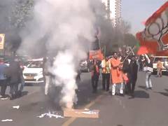 
      
      Delhi poll trends: BJP workers celebrate, burst firecrackers
      
      