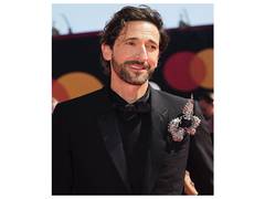 
      
      Adrien Brody showers love on Georgina Chapman after winning...
      
      
