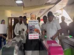 
      
      Congress workers protest against centre over increased metro fare
      
      