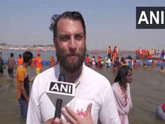 
      
      Devotee from Australia takes holy dip at Mahakumbh 
      
      
