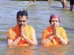
      
      Tripura CM Manik Saha, his wife takes holy dip at Triveni Sangam
      
      