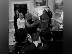 
      
      US President Donald Trump hugs PM Modi while welcoming him 
      
      