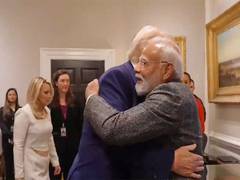 
      
      Trump welcomes PM Modi with hug, says 