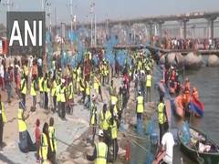 
      
      Sanitation workers at Maha Kumbh clean ghats of Triveni Sangam
      
      