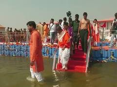 
      
      Dharmendra Pradhan takes holy dip at Triveni Sangam
      
      