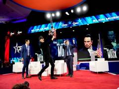 
      
      Elon Musk, joined by Argentine President, wields chainsaw at CPAC
      
      