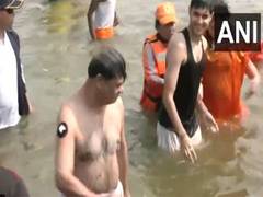 
      
      Mahakumbh: Assam CM takes holy dip at  Triveni Sangam
      
      