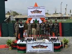 
      
      Communities surrender weapons in Manipur post governor's appeal
      
      