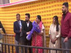 
      
      People gather outside CM Rekha Gupta’s residence 
      
      