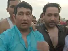 
    Shekhar Suman. son Adhyayan take holy dip at Maha Kumbh 
    
