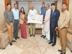 
      
      Gujarat CM Patel receives Rs10.65 crore dividend cheque
      
      