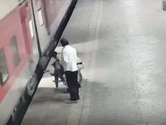 
      
      Railway security personnel rescues woman dragged by moving train
      
      