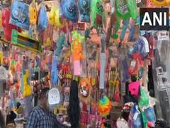 
      
      Holi festivities gain momentum, markets abuzz with colourful shop
      
      