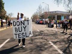 
      
      Trump to buy Tesla as mark of support for Elon Musk
      
      