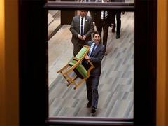 
      
      Justin Trudeau exits Parliament with chair in hand
      
      
