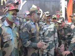 
      
      BSF troops celebrate Holi near international border in RS Pura
      
      