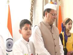
      
      Pushkar Singh Dhami celebrates Holi with at his residence 
      
      