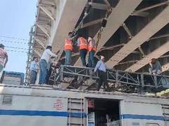 
      
      Restoration work underway,  after truck collided with train 
      
      