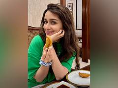 
    Shraddha Kapoor gorges on gujiyas as she celebrates Holi
    