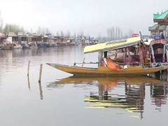 
      
      Tourists enjoy chilly morning weather at Dal Lake in Srinagar
      
      