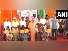 
      
      CM Yogi distributes motorised tricycles to differently-abled
      
      