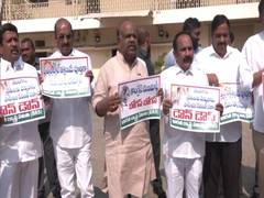 
      
      BRS MLCs stage protest in Telangana Legislative Council
      
      