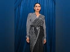 
    Karisma Kapoor steals show in monochrome sari at Lakme Fashion
    
