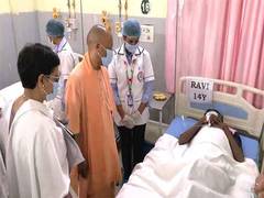 
      
      Uttar Pradesh CM Yogi Adityanath meets children affected by food 
      
      